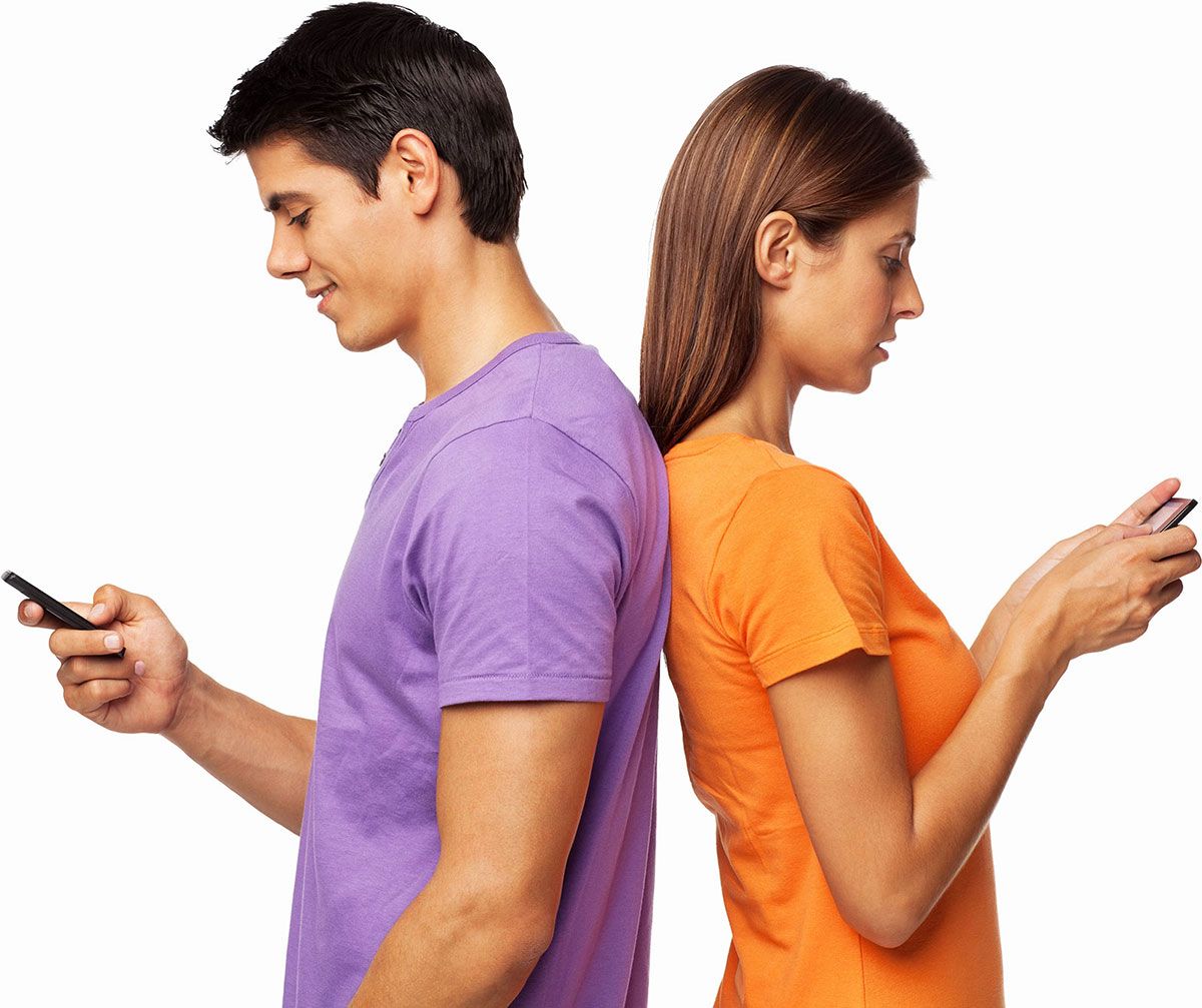 couple using phones