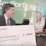 BayPort CEO Jim Mears presents check to Debt Paydown winner
