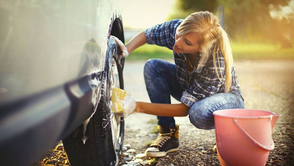 woman washing car